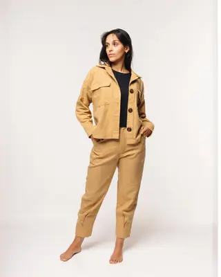 calça fertilità bege